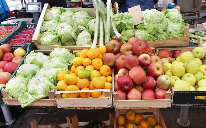 fresh fruits and vegetables at a farmer's market stall