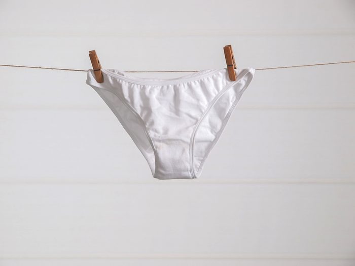 white underwear hanging on clothesline
