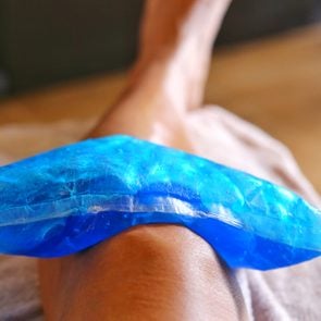 Use a cool bag to treat a knee injury.