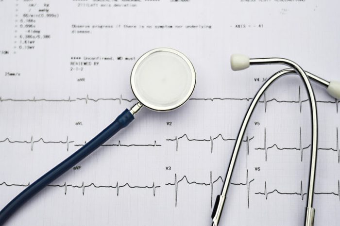 Stethoscope and electrocardiogram (EKG).