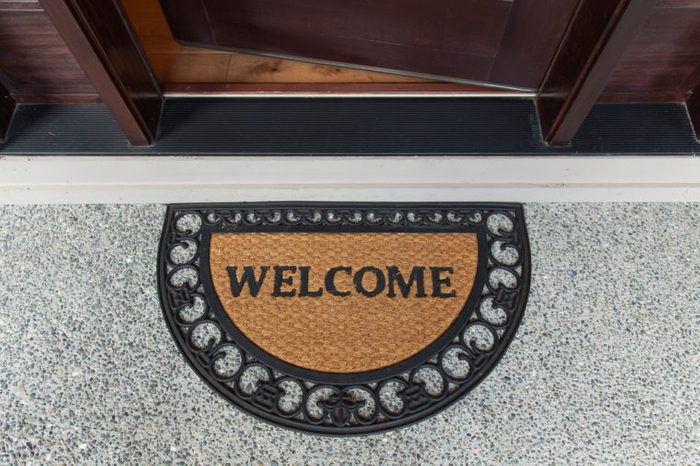 Welcome mat with open door