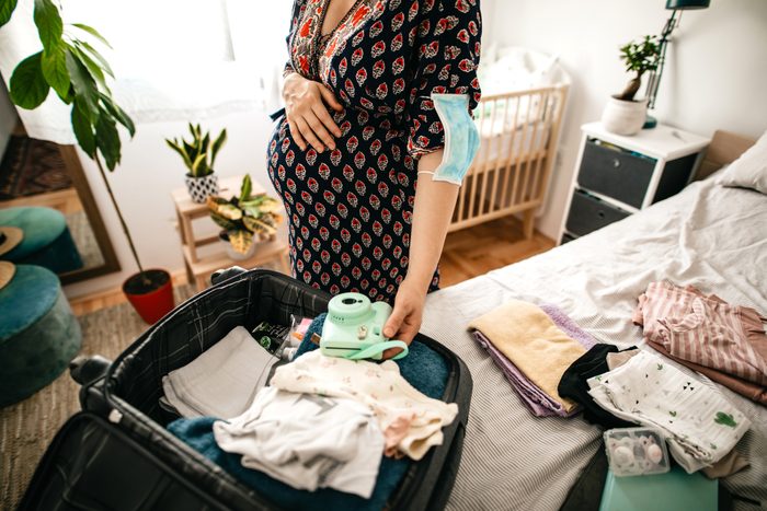 pregnant woman packing hospital bag