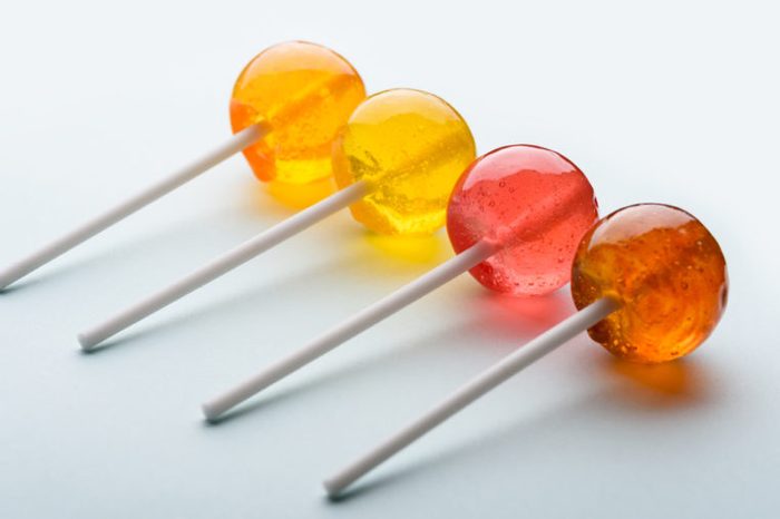 Yellow, red, and orange lollipops