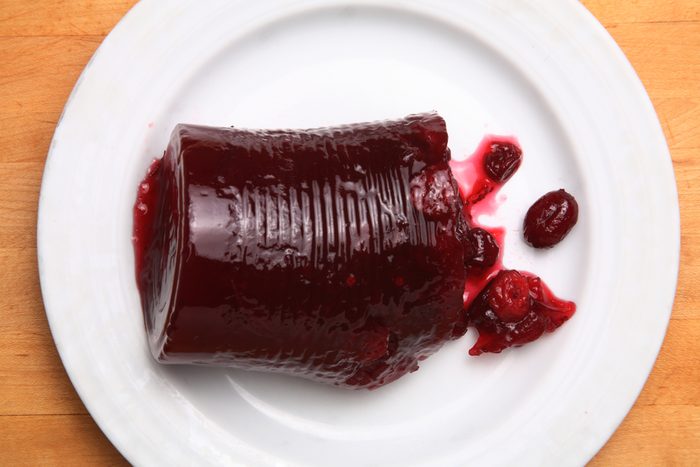 Canned cranberry sauce on white plate