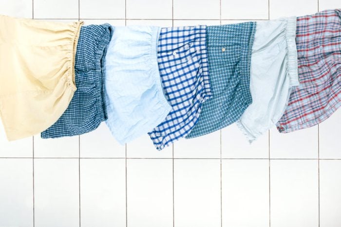 Men's boxer briefs hanging on a rope to dry