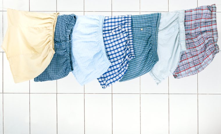Men's boxer briefs hanging on a rope to dry