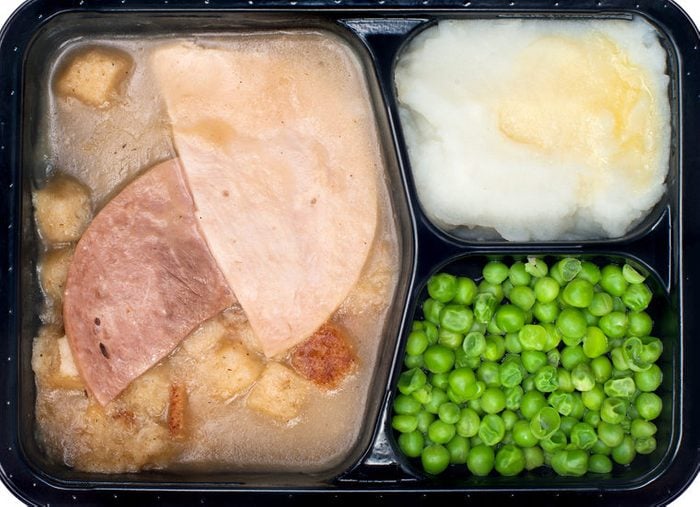 frozen meal with ham, peas, and mashed potatoes