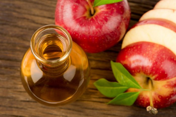 Red apple and Apple Cider Vinegar.