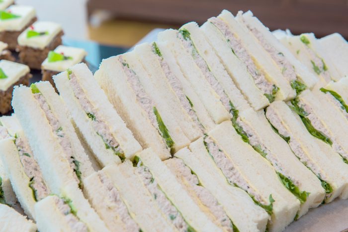 Tuna sandwiches with white bread.