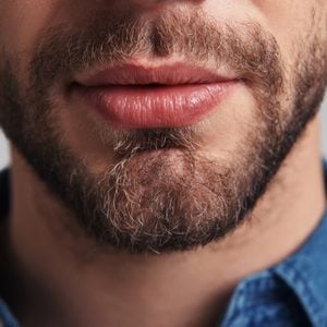 close up of man's mouth and beard