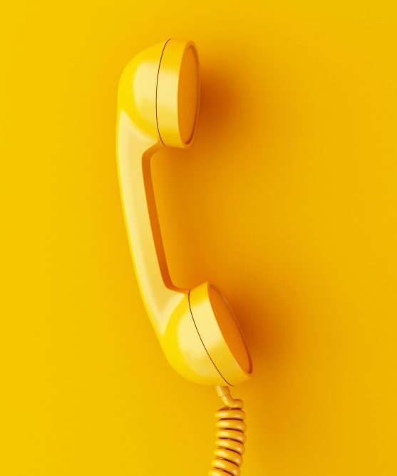 3d illustration. Vintage phone reciever on yellow background. 