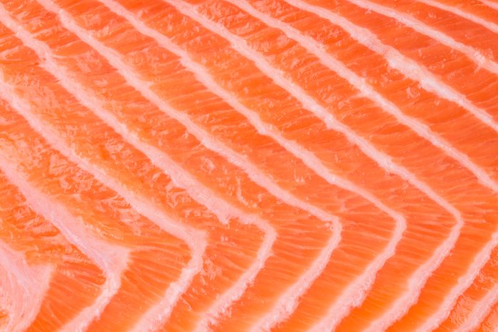 Close up of salmon fillet. Macro. Whole background.