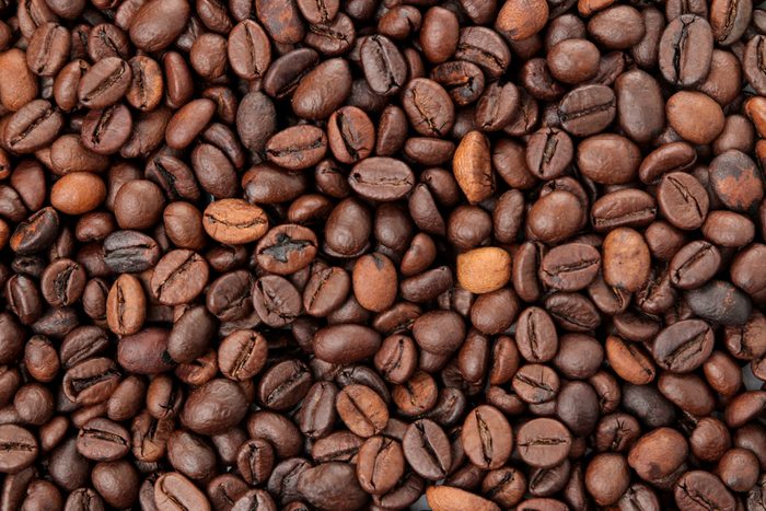 many different types of coffee beans. Background of coffee. fried coffee beans. coffee beans