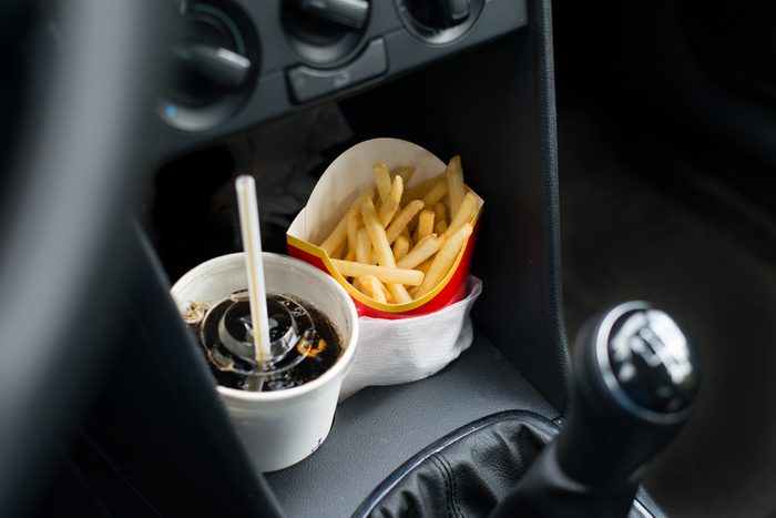 Coke and French fries, fast food in the car, Snack on the road