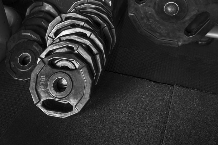 Free weights in the Gym with Dark tone background