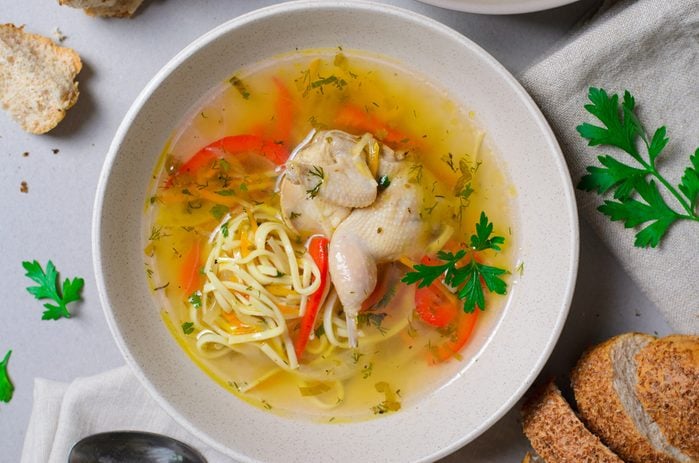 Quail Noodle Soup, Homemade Broth with Noodles and Vegetables Served with Bread Rolls, Comfort Food, Zeama, Traditional Moldavian and Romanian Soup