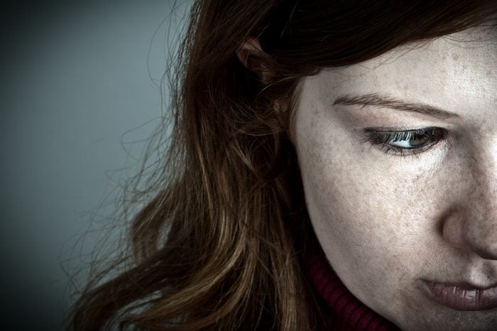 pale red headed woman with freckles