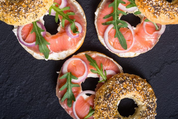 bagels with salmon , cream cheese and onion