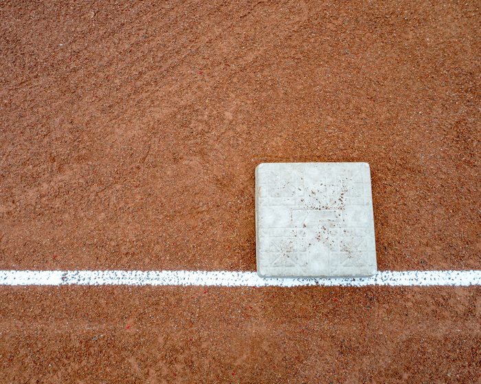 Little league bases on high school baseball diamond.
