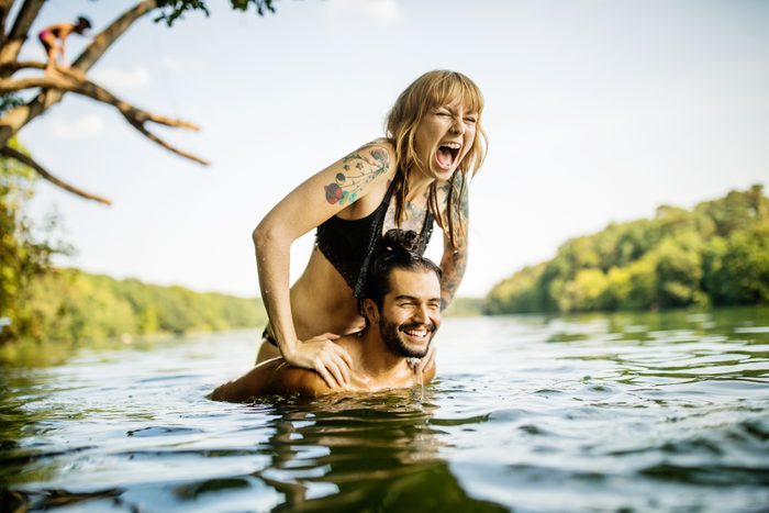couple having fun in the lake