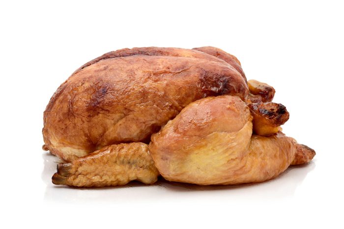 a roast turkey or a roast chicken on a white background