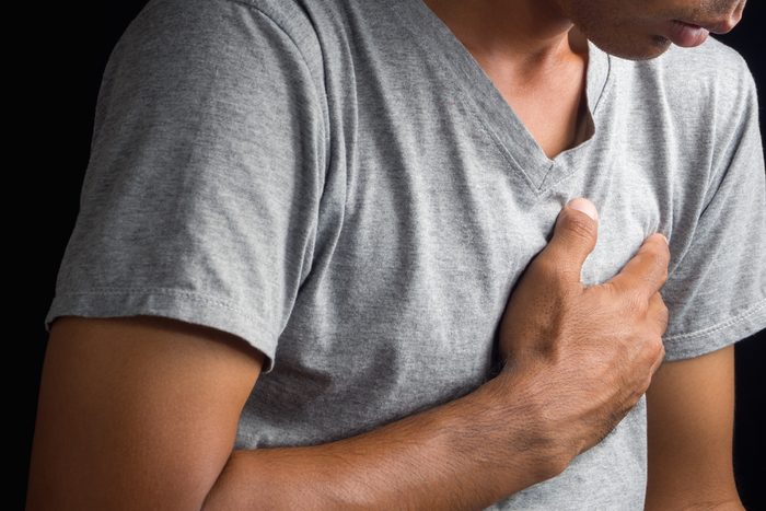 Man having chest pain, heart attack.