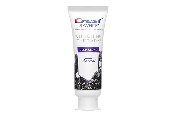 tube of Crest 3d White Whitening Therapy Charcoal Deep Clean Fluoride Toothpaste