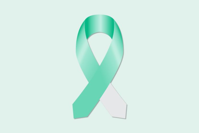 teal and white ribbon for cervical cancer