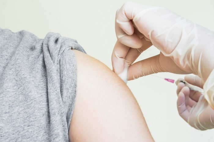 arm shot flu sick vaccine