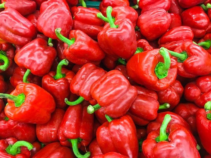 Red sweet bell pepper on the shelf in the fresh market