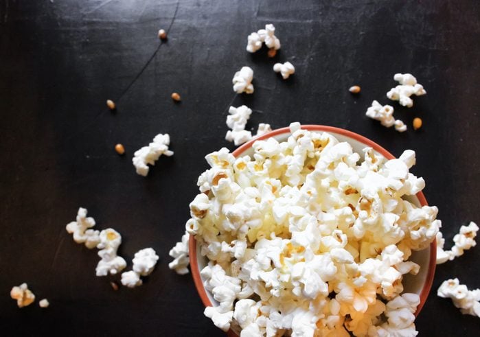 Popcorn in bowl food on black background