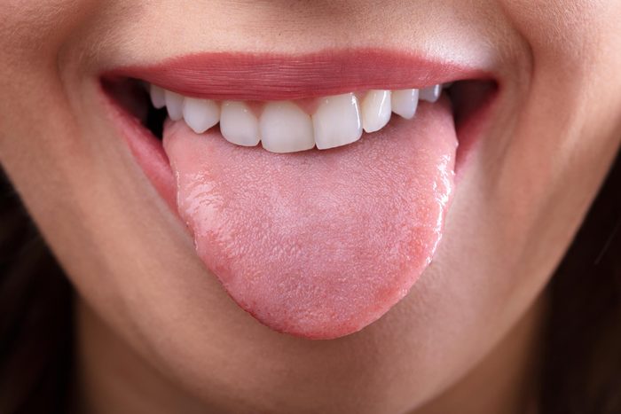 Woman sticking out her tongue.