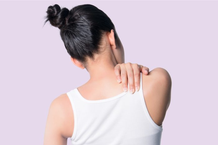 woman upper back neck pain