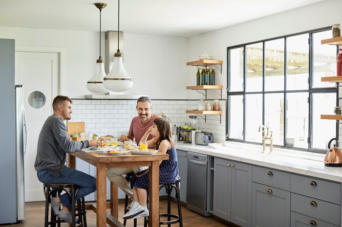 family eating together in kitchen