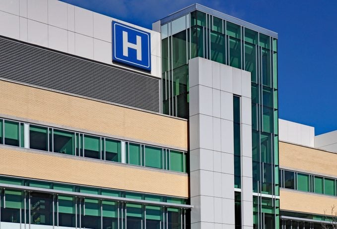 Modern style building with large H sign for hospital
