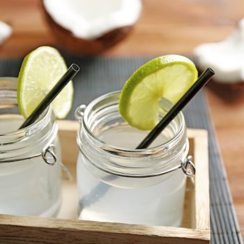 Set of mason jars with coconut water