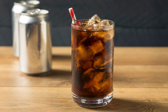 Bubbly Refreshing Dark Soda with Ice in a Glass