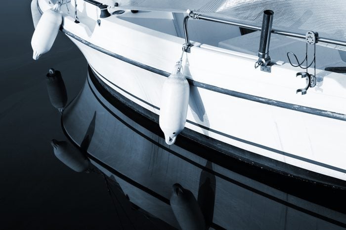 A close-up of a yacht in Antibes, France. Blue tone, copy space.