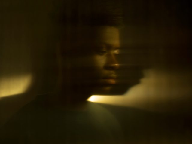 blurry long exposure portrait of a man