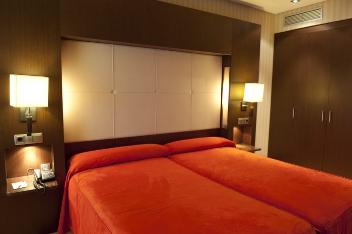Luxury hotel room in red colors
