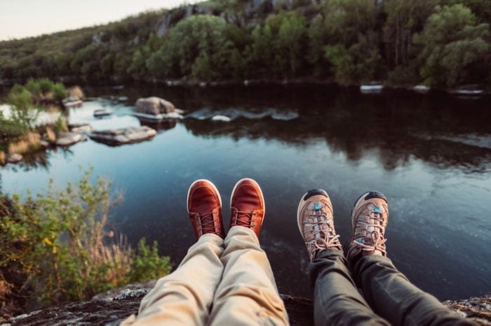 boots overlooking Mountain View lake love couple hiking mental health