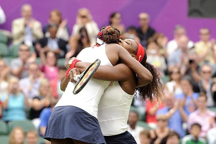 Serena Williams and Venus Williams win Olympic Doubles Gold hug