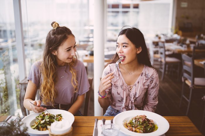 two women eating at restaurant