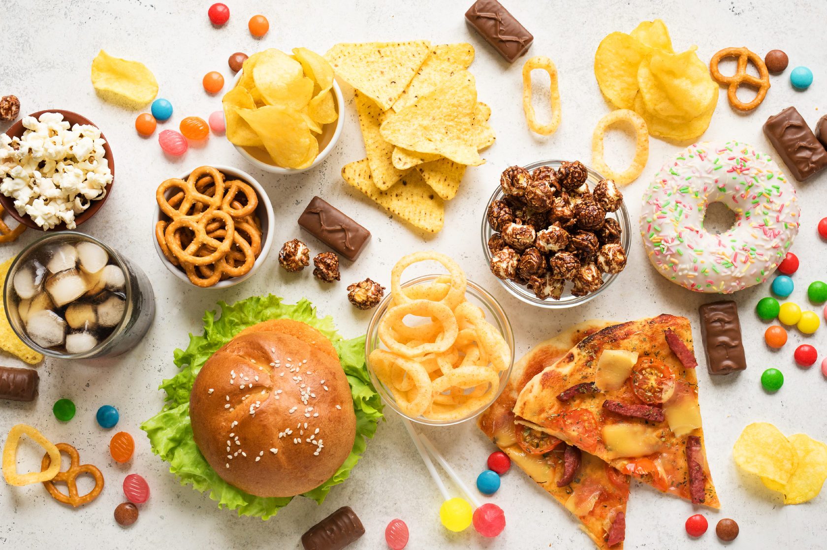 assortment of unhealthy snacks and foods overhead studio