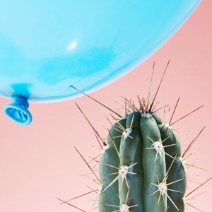 stress concept with cactus and balloon