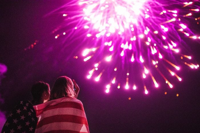 two girls watching fireworks