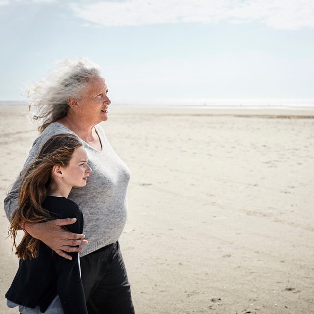 granddaughter and grandmother on the beach
