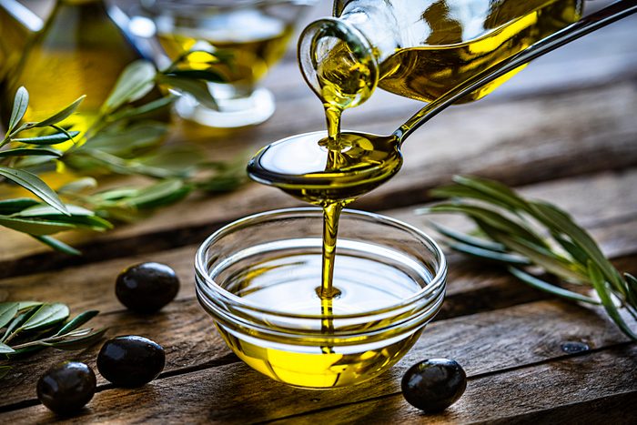 Pour extra virgin olive oil into a glass bowl