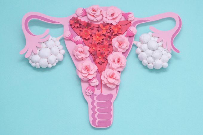 uterus paper art on blue background, PCOS concept