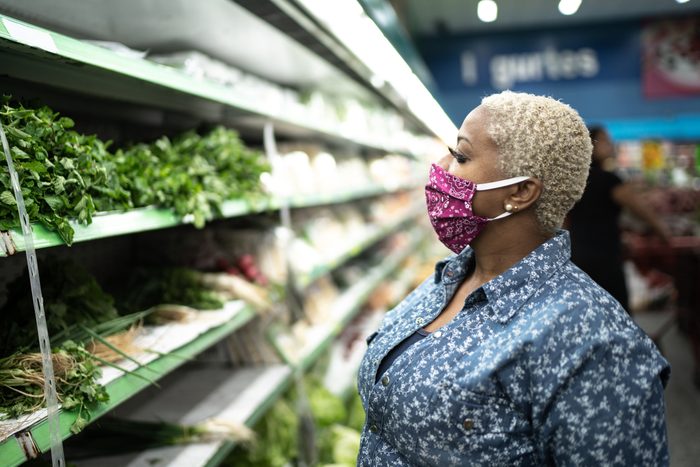 woman wearing face mask in grocery store